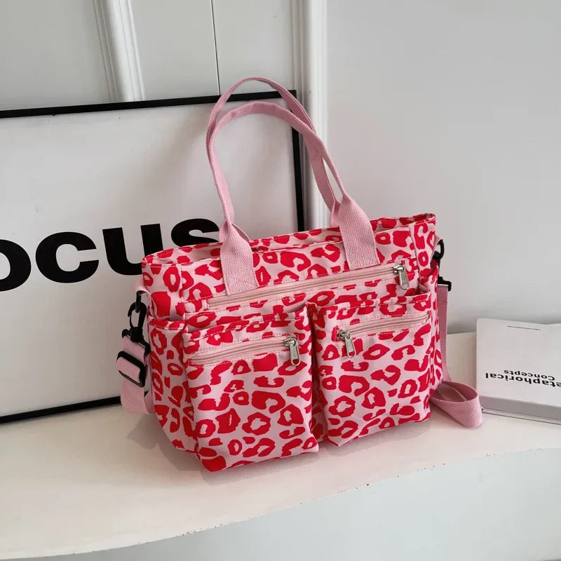 Tessi | Praktische Leopard Schoudertas met Vakken