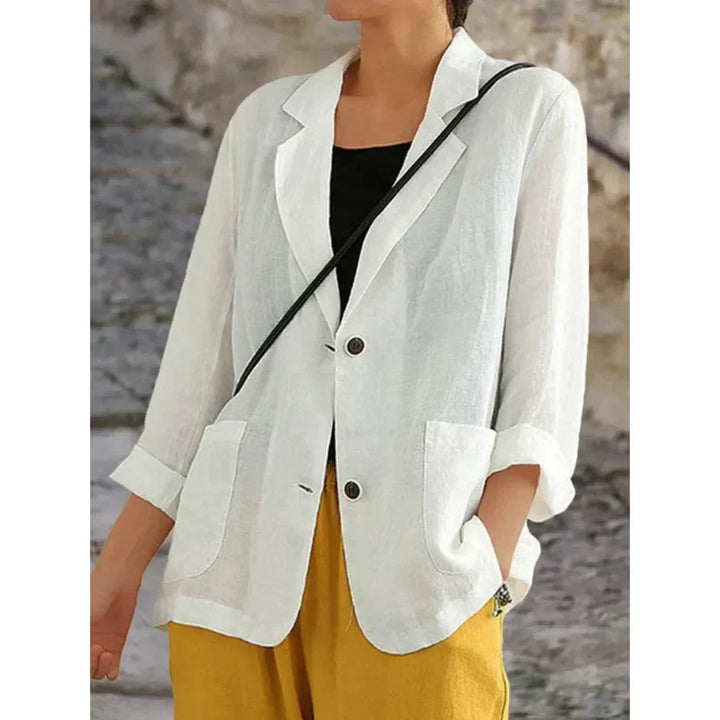 Blazer femme légèrement cintré avec détail de bouton décontracté