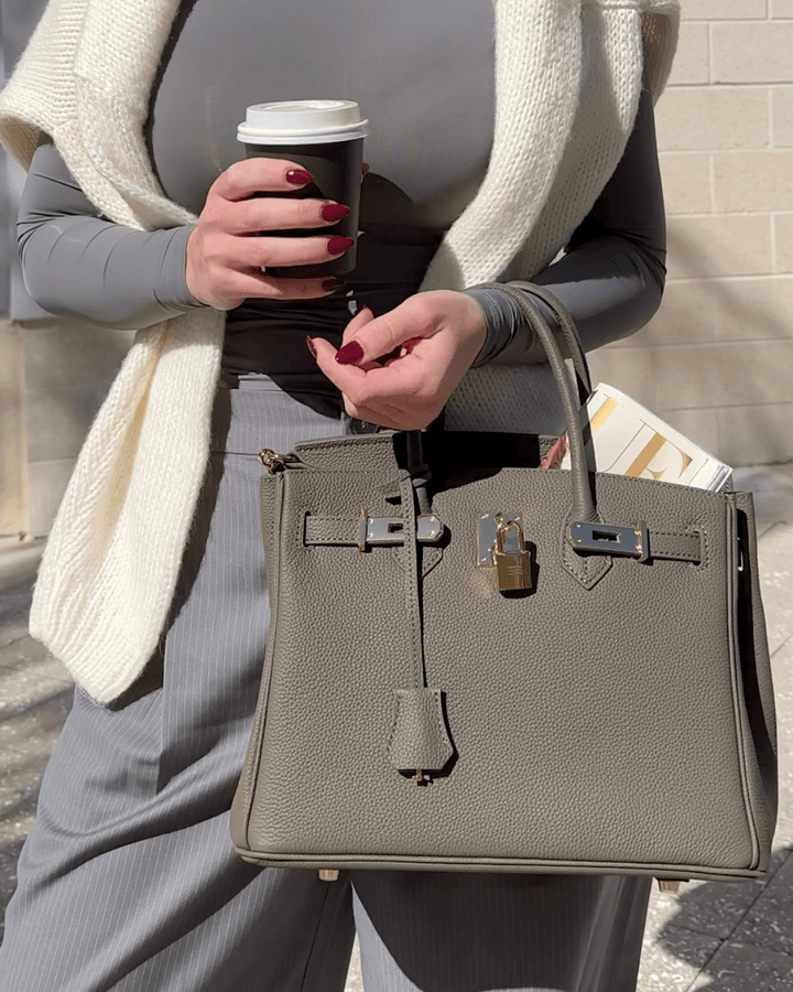 Elegant Women's Handbag with Gold-Toned Lock Detail