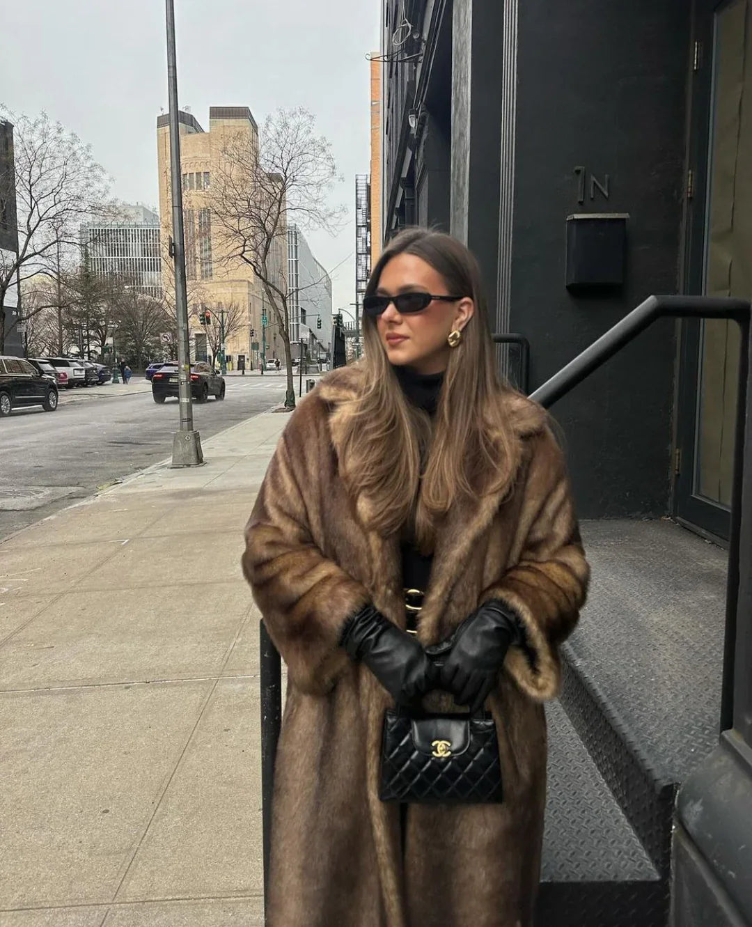 Luxe warme dames winterjas met lange elegante pasvorm