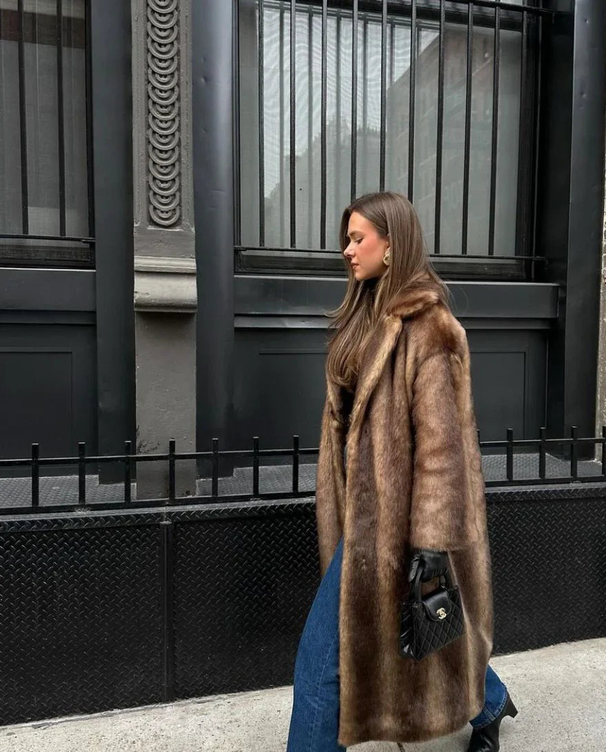 Luxe warme dames winterjas met lange elegante pasvorm
