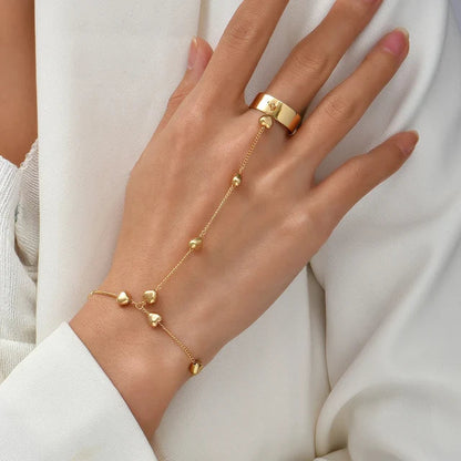Pixi | Goudkleurige Handketting met Hartdetails