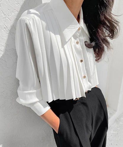 Verfijnde geplooide dames blouse met lange mouw