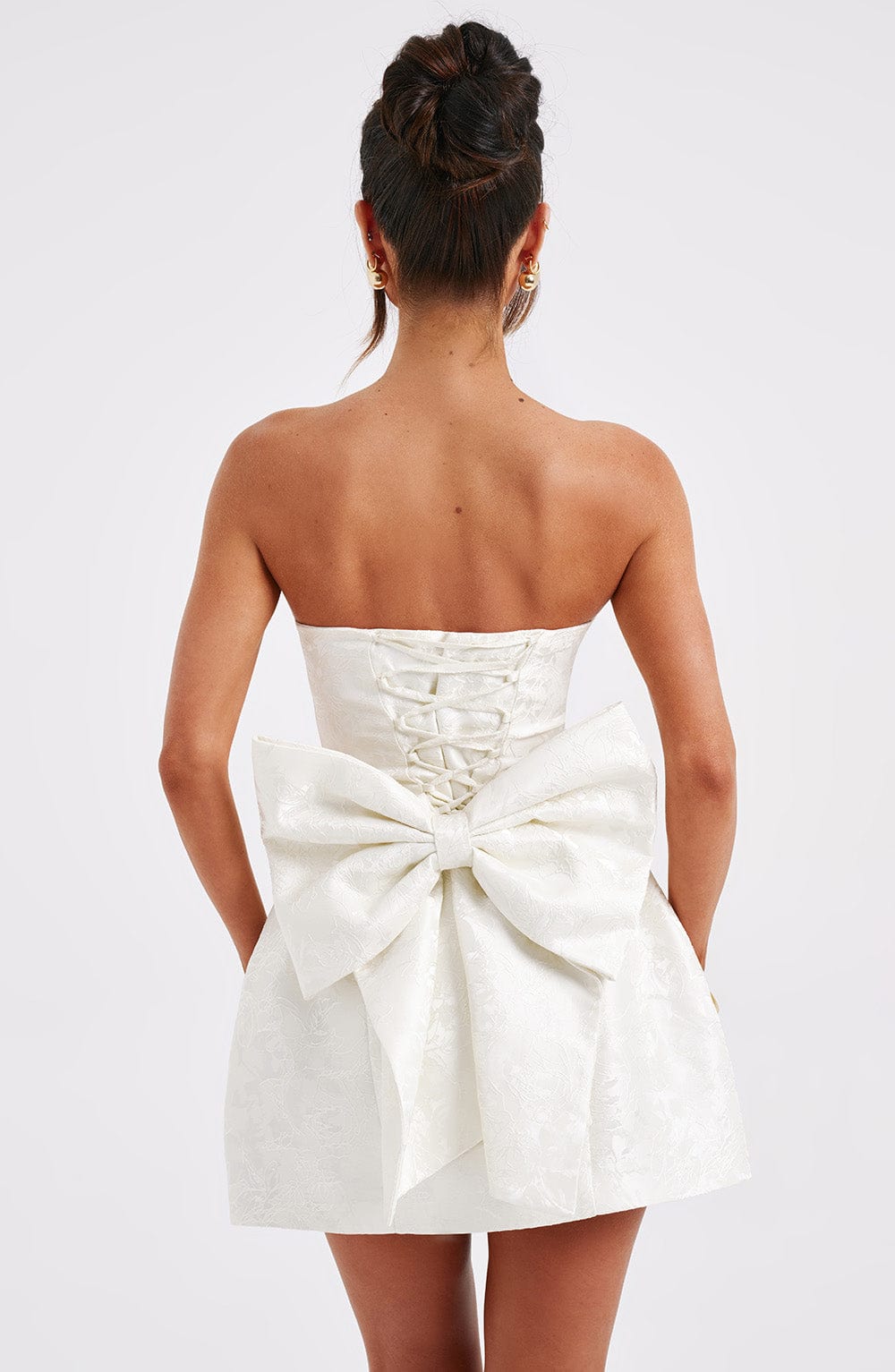 Yanci | Luxe Strapless Mini Jurk met Strikdetail