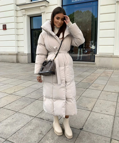 Lange Dames Puffer Winterjas met Ceintuur en Hoge Kraag