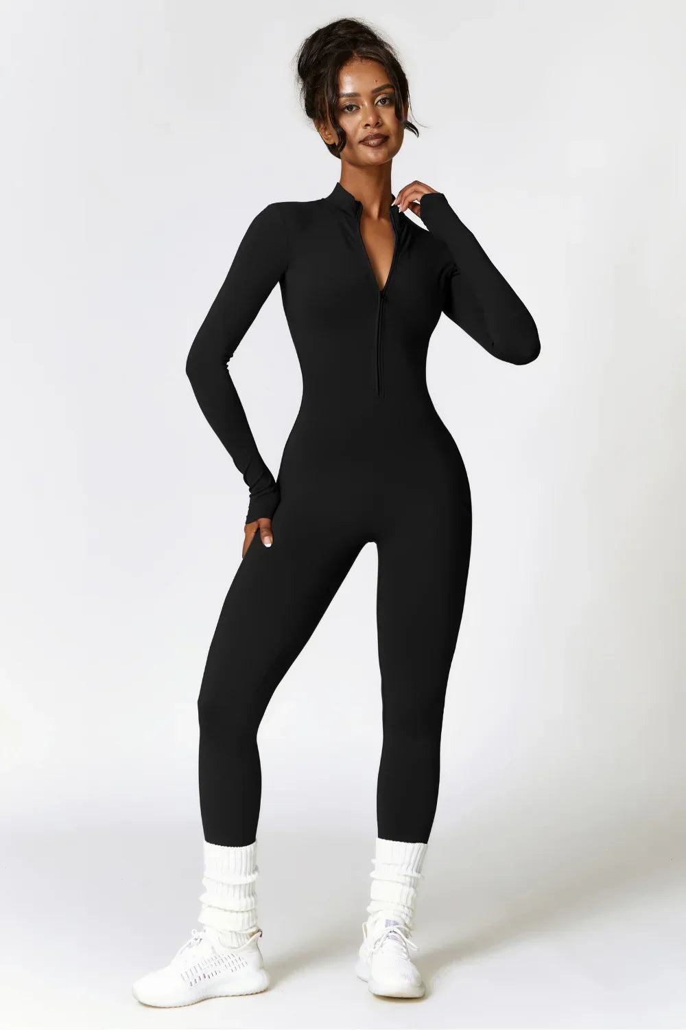 Sportieve Aansluitende Dames Jumpsuit Met Half Zip En Lange Mouwen