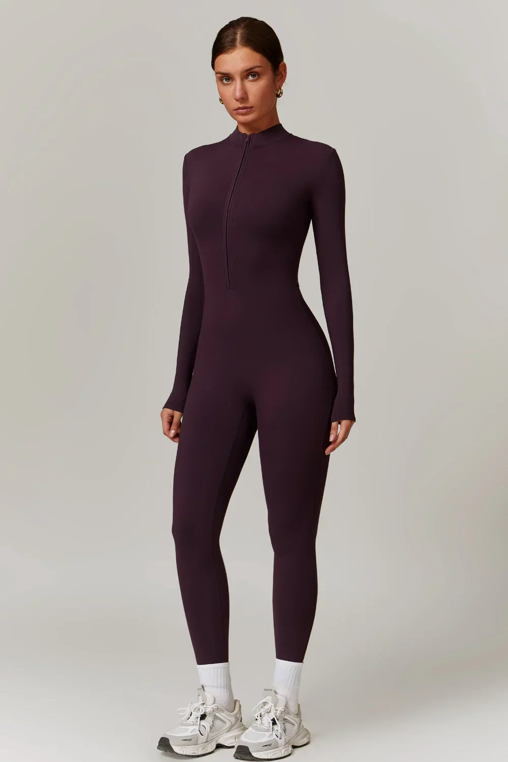 Sportieve Aansluitende Dames Jumpsuit Met Half Zip En Lange Mouwen