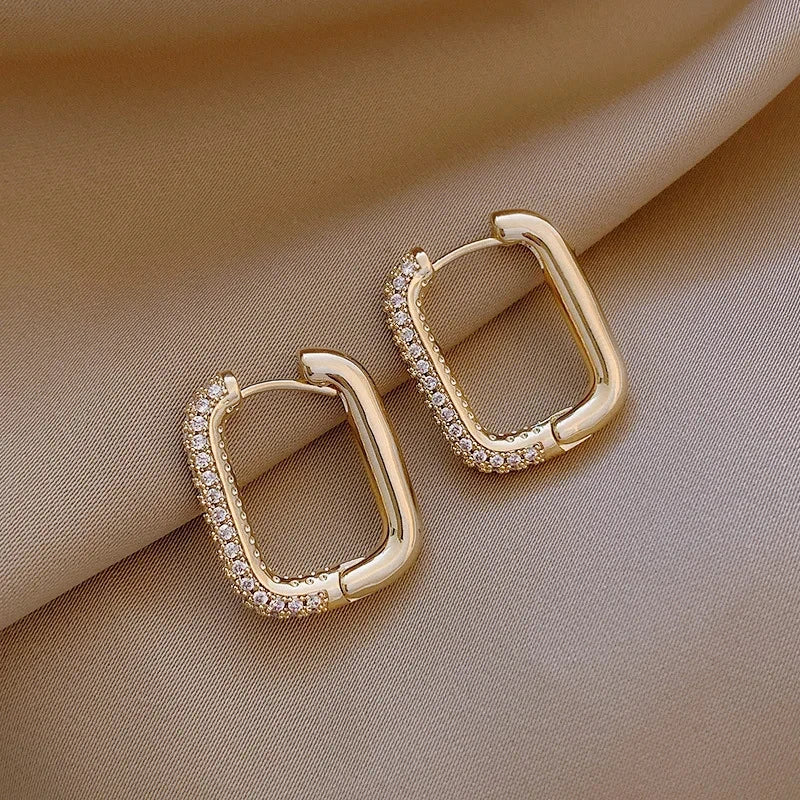 Laeticia | Boucles d'oreilles angulaires étincelantes