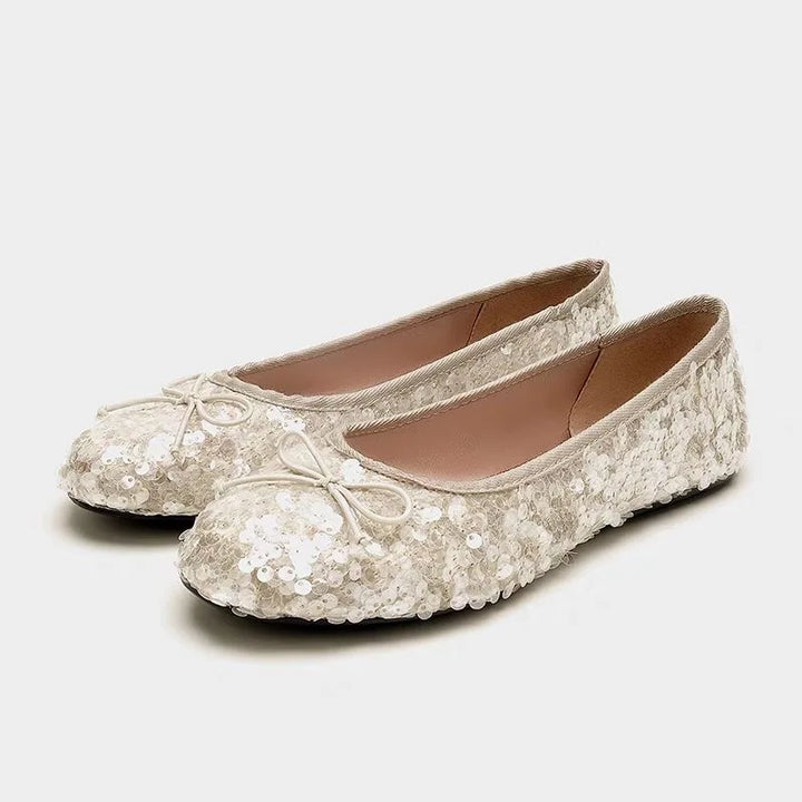 champagne kleurige ballerina flats met pailletten en strik