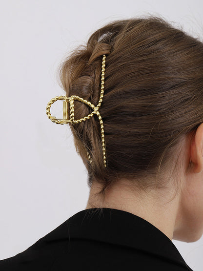 Gouden Elegante Dames Haarclip met Gedraaide Afwerking