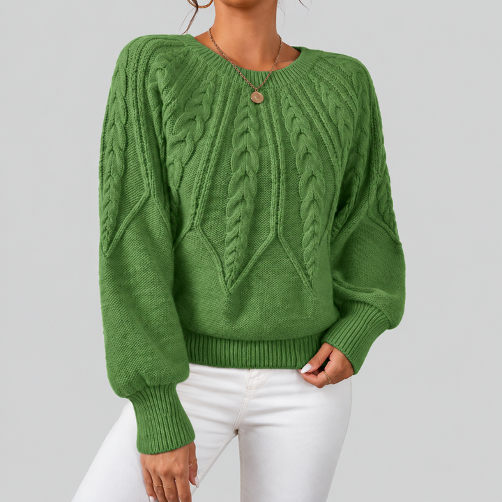 Women's knitted sweater with cable-knit pattern and round neckline