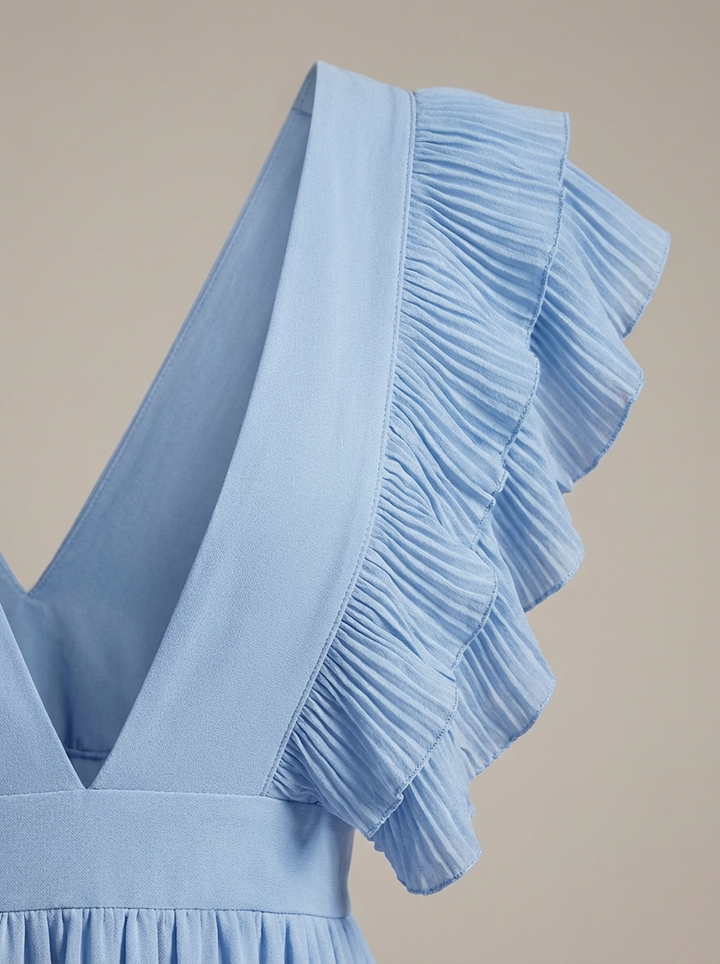 Zwiewna sukienka maxi damska z falbanami i głębokim dekoltem w serek