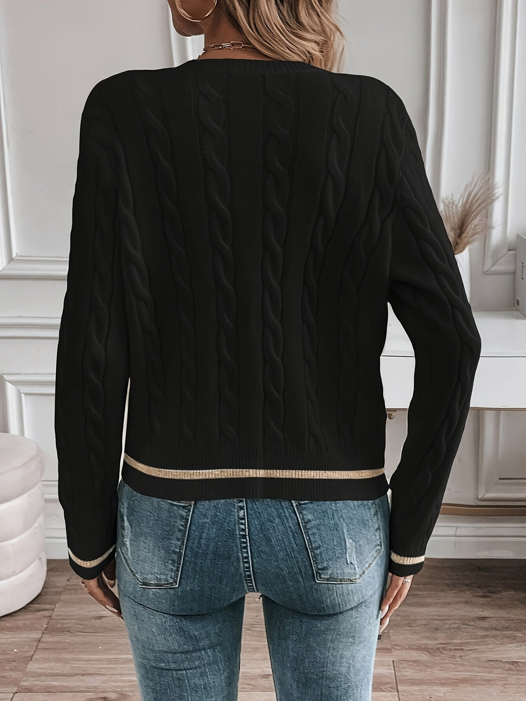 Josephine cable-knit cardigan, back view showing ribbed trim detail